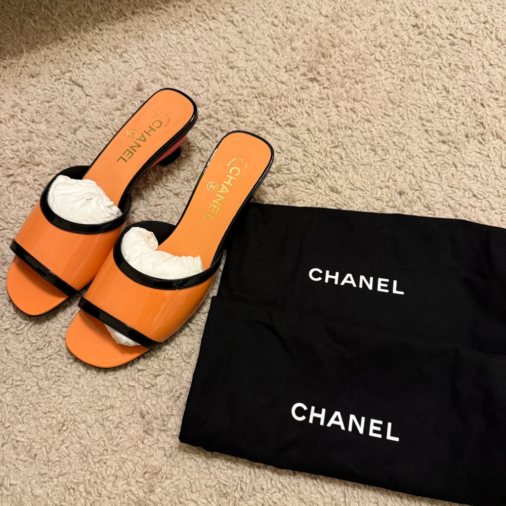 Authentic Chanel Mules orange/black size 38